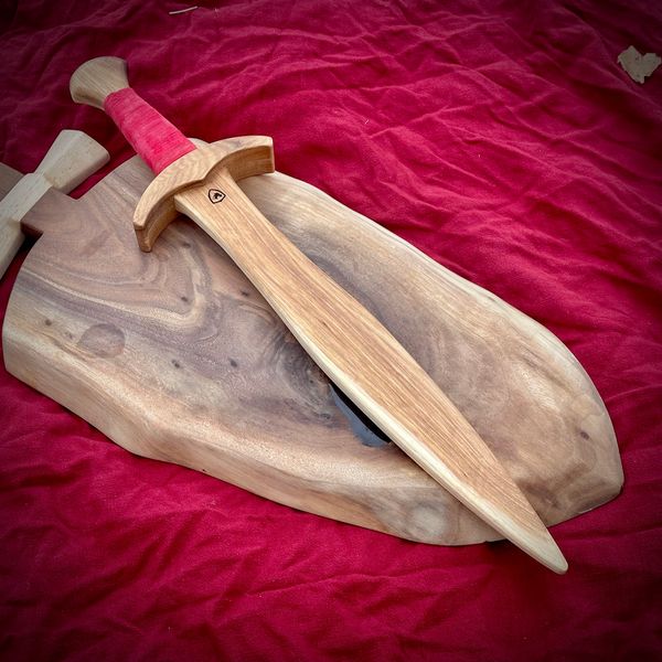 Hickory halfling-sized sword with a red wrapped grip
