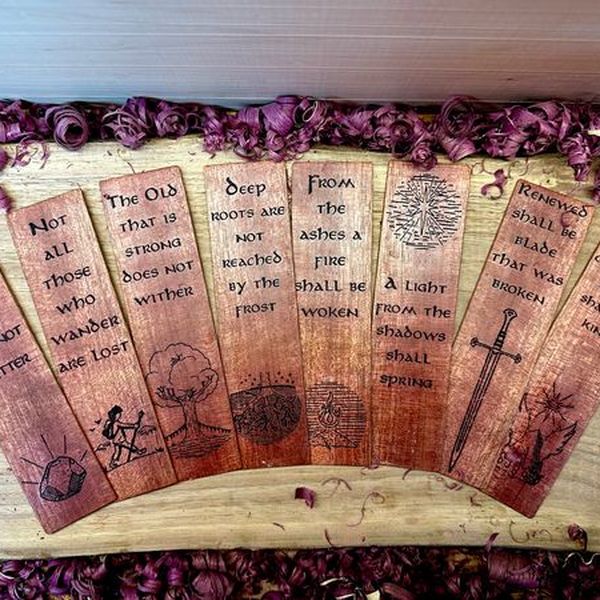 Set of eight engraved wooden bookmarks with the All That Is Gold poem